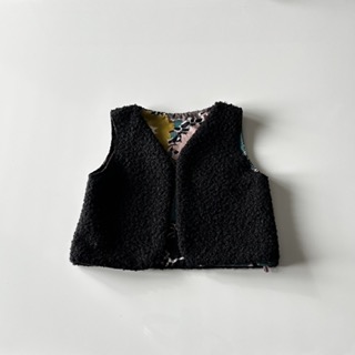 Gilet sans manches noir en fausse fourrure